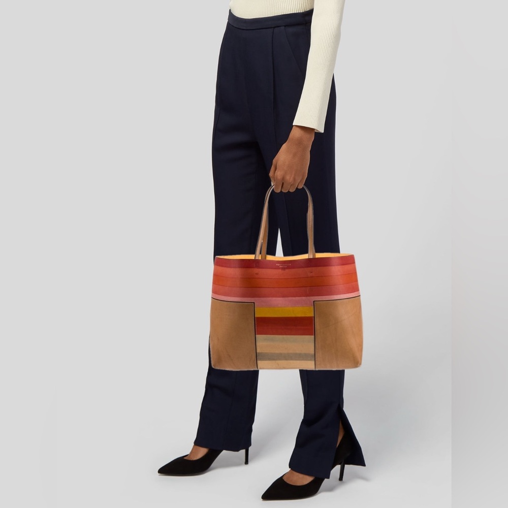 •	Tory Burch Tote
	•	Brown, Neutrals, Red & Yellow Leather